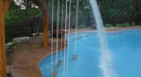 Swim-up-bar-rope-swing-cantiliever-coping-fire-bowl-rain-decent-waterfall-underwater-speaker