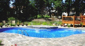 Gray-stamped-concrete-tiered-deck-raised-wall-sheer-decent-color-coordinates-OFallon