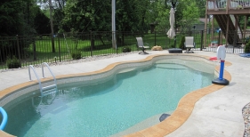 Figi-freeform-fiberglass-tanning-shelf-benches-kids-swimming-broom-finish-concrete