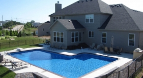 L-shape-true-L-pool-vinyl-liner-tumbled-rock-landscape-retaining-wall-diving-board-sprayers