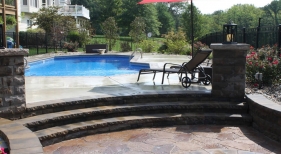 Step-up-tiered-deck-step-down-firepit-offset-grecian-geometric-latham-Ft-Wayne-strong-support